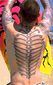 A tattoo that may be his spine and ribs.
