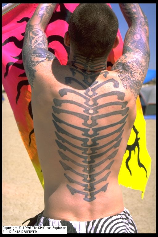 A tattoo that may be his spine and ribs.
