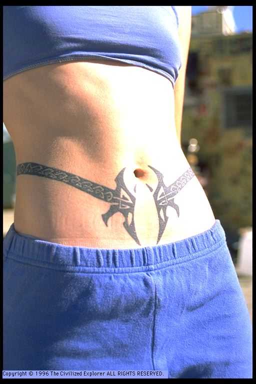 Stylized guitars around her waist.